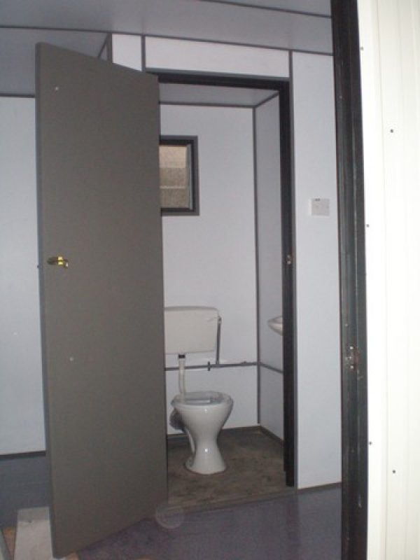internal_portable_toilet_cabin_with_sitting_and_water_tap-600x800